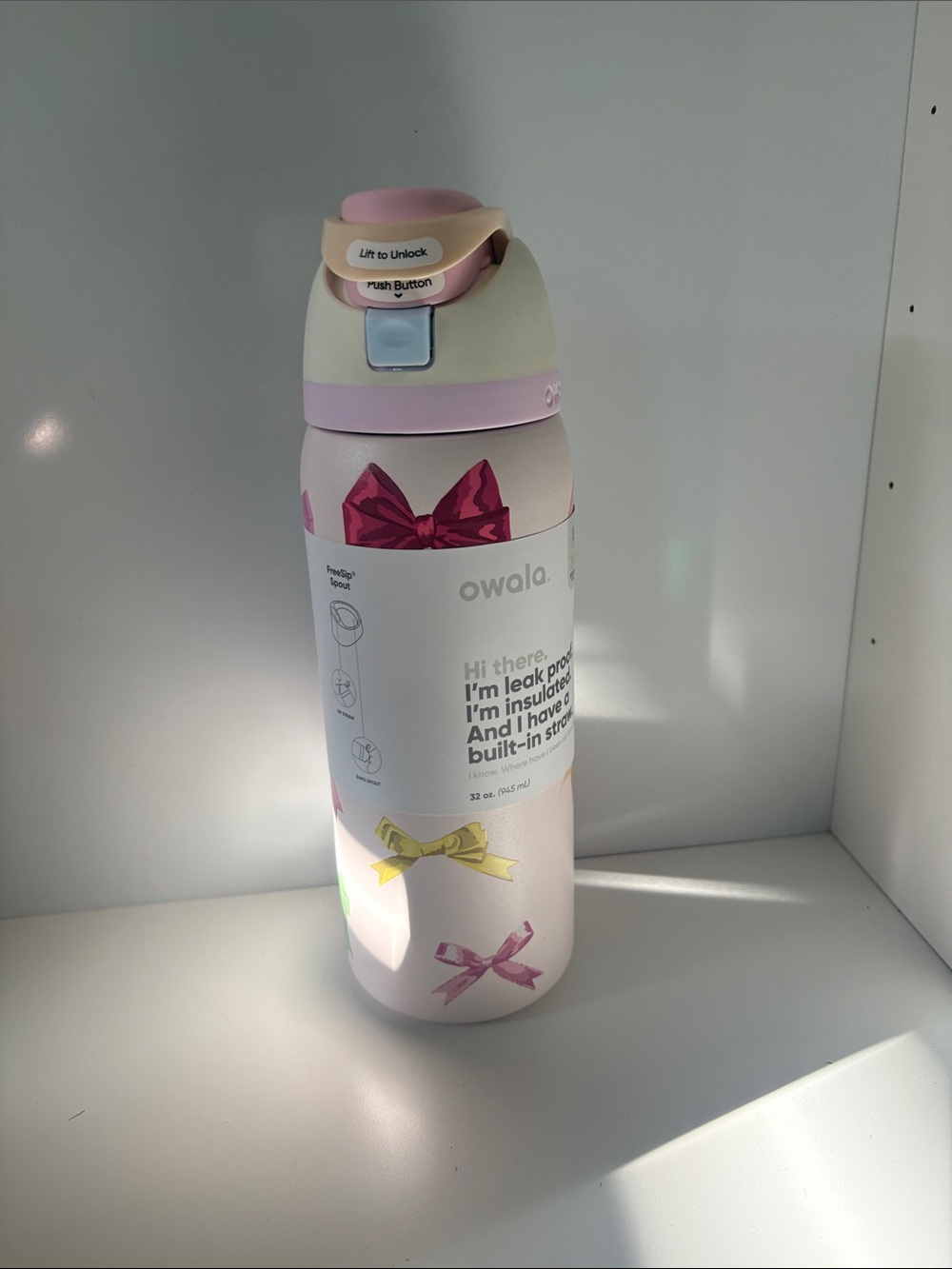 Owala Pink Insulated Water Bottle with Bow Print